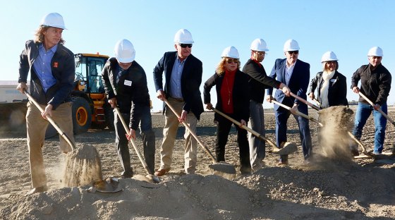 West Hills College District officials help out with turning the first shovel of dirt for new WHC Lemoore building.